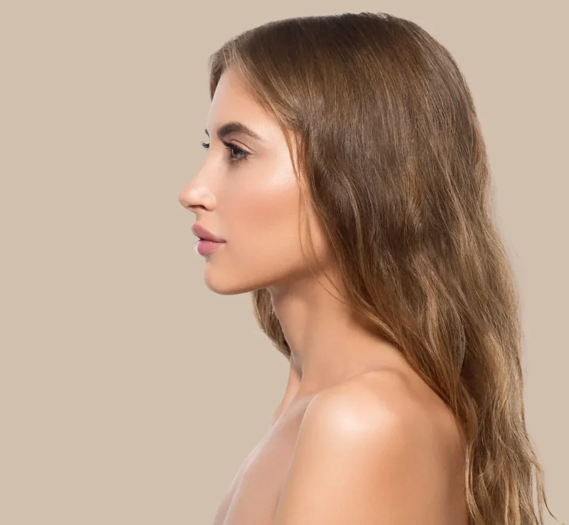 Woman in profile view displaying nose shape and facial proportions
